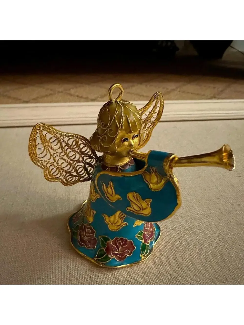 Vintage hand painted and glazed ceramic angel with trumpet 3d details